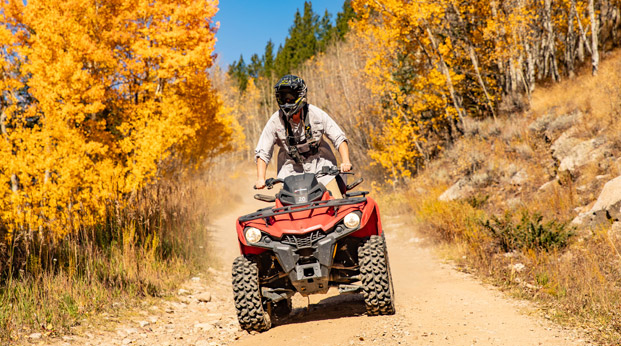 A Nova Guides guest on an ATV tour in fall